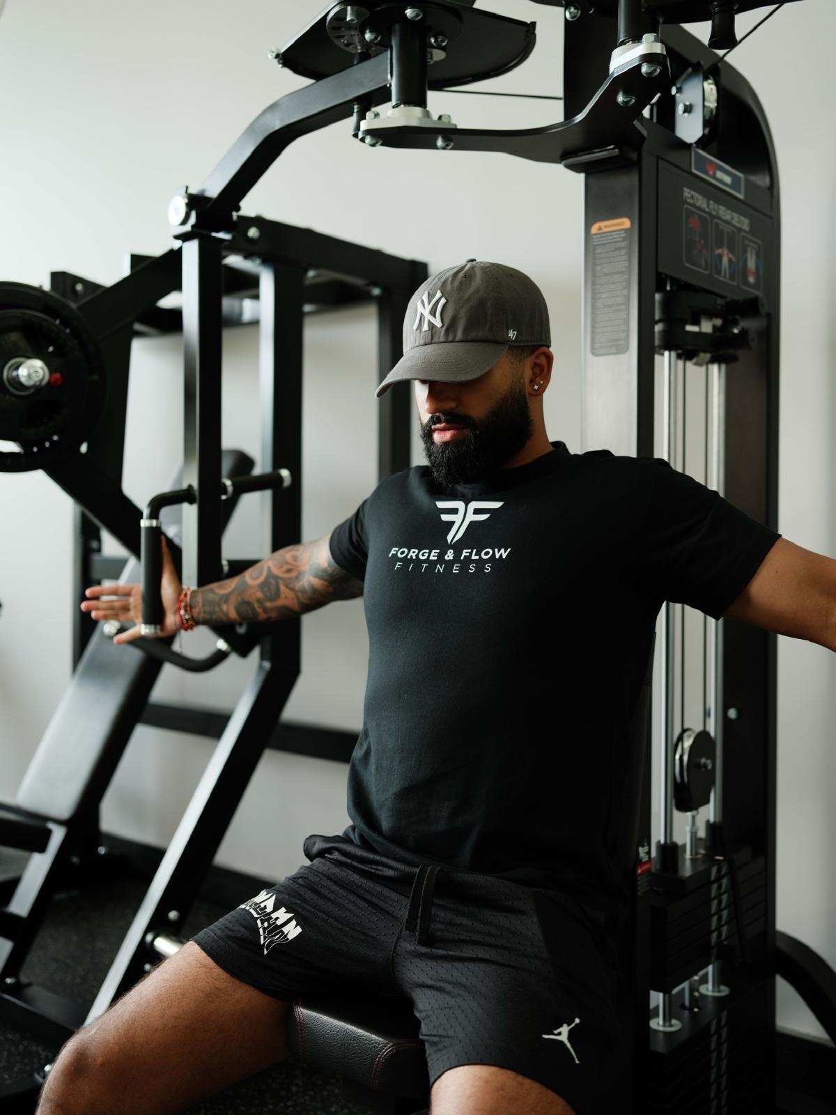 Strength machine training at Forge & Flow Fitness